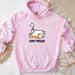 a pink sweatshirt with a cartoon dog holding a tennis racket