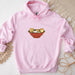 a pink hoodie with cats in a bowl on it