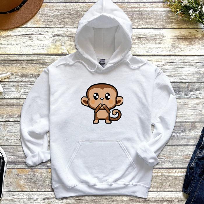 a white hoodie with a cartoon monkey on it