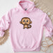 a pink hoodie with a cartoon monkey on it