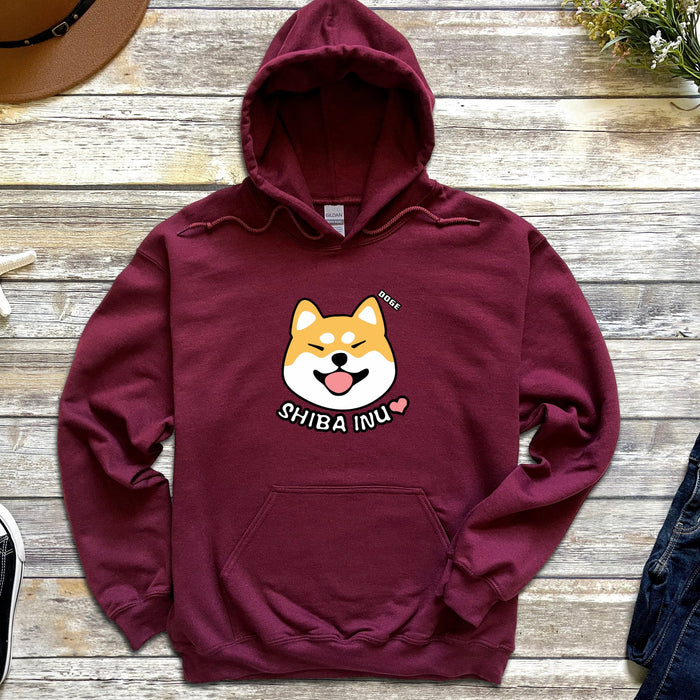 a red hoodie with a corgi on it