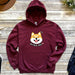 a red hoodie with a corgi on it