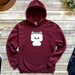 a red sweatshirt with a white dog on it