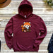 a red hoodie with a picture of a fox on it