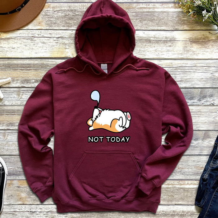 a red sweatshirt with a cartoon dog holding a tennis racquet