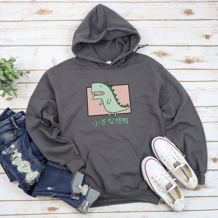 a gray hoodie with a green dinosaur on it