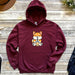 a red hoodie with a cartoon fox on it