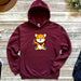 a red hoodie with a cartoon fox on it