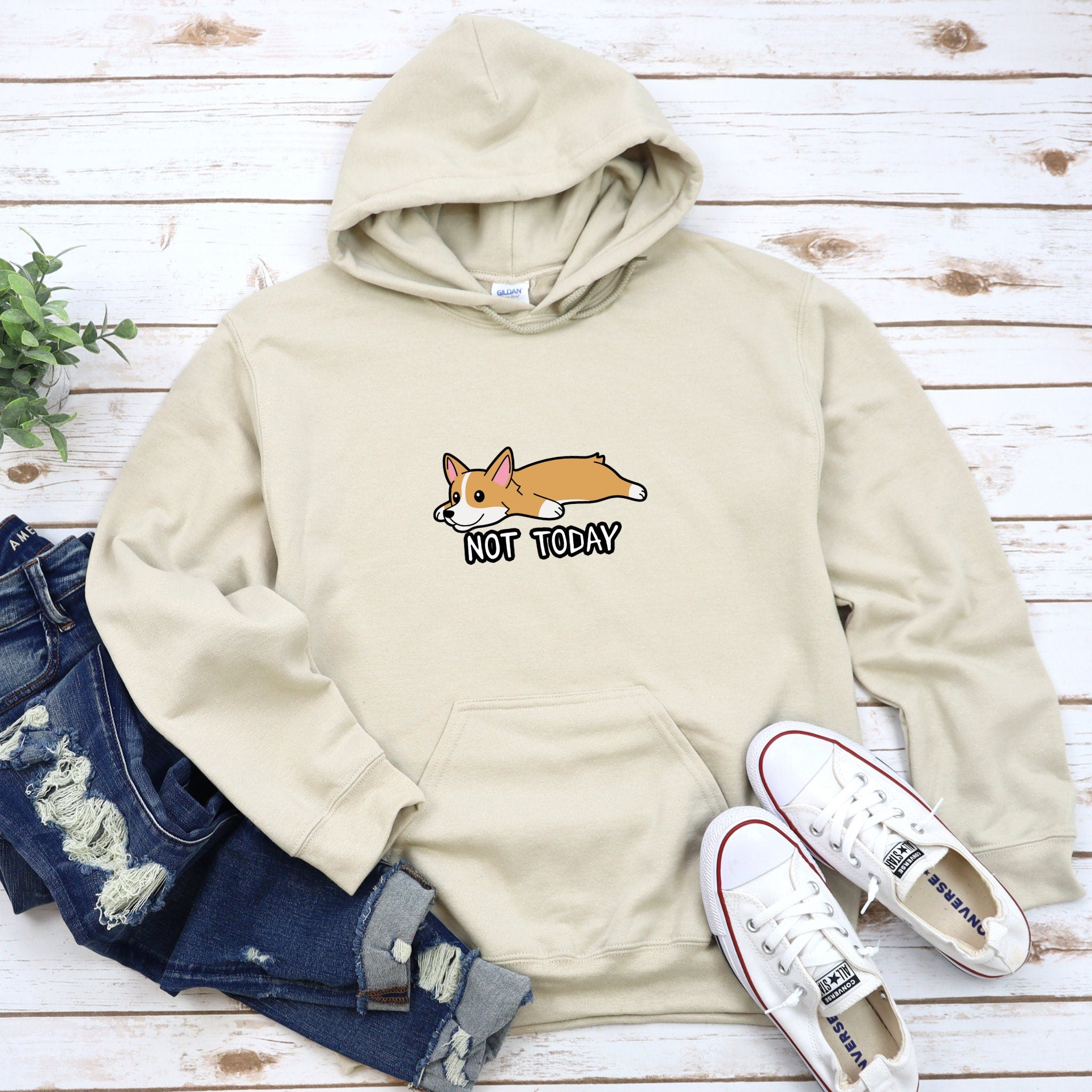 a sweatshirt that says, not today with a dog on it