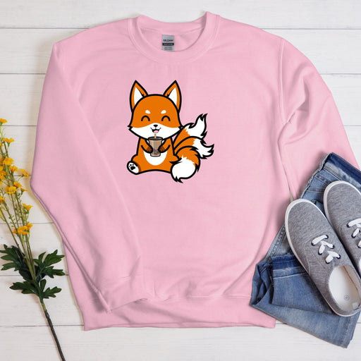 a pink sweatshirt with a picture of a fox on it