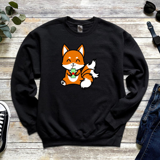 a black sweater with a fox eating a green leaf