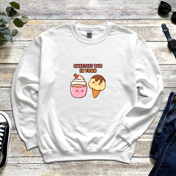 a white sweatshirt with an ice cream and a donut on it