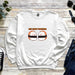 a white sweatshirt with a picture of two sushi sushi sushi sushi