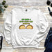 a white sweatshirt with two tacos on it