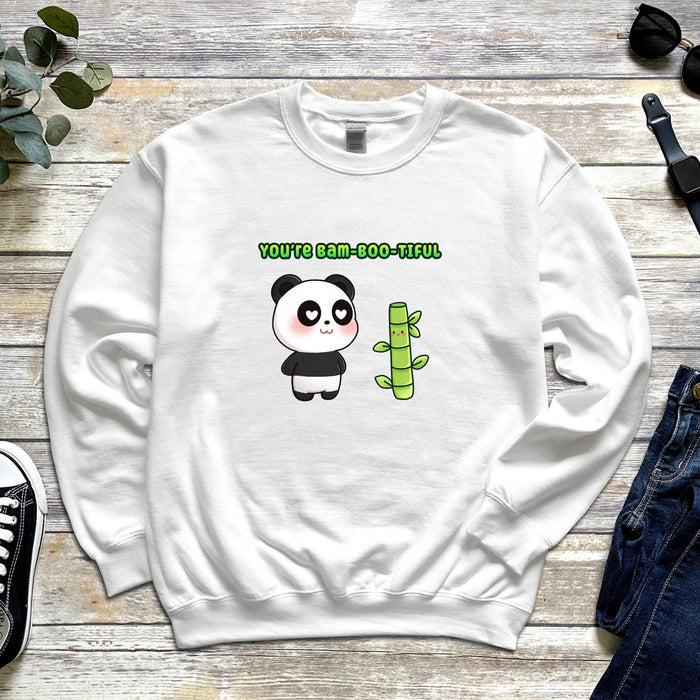 a white sweatshirt with a panda holding a cactus