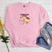 a pink sweatshirt with an ice cream cone and a donut on it