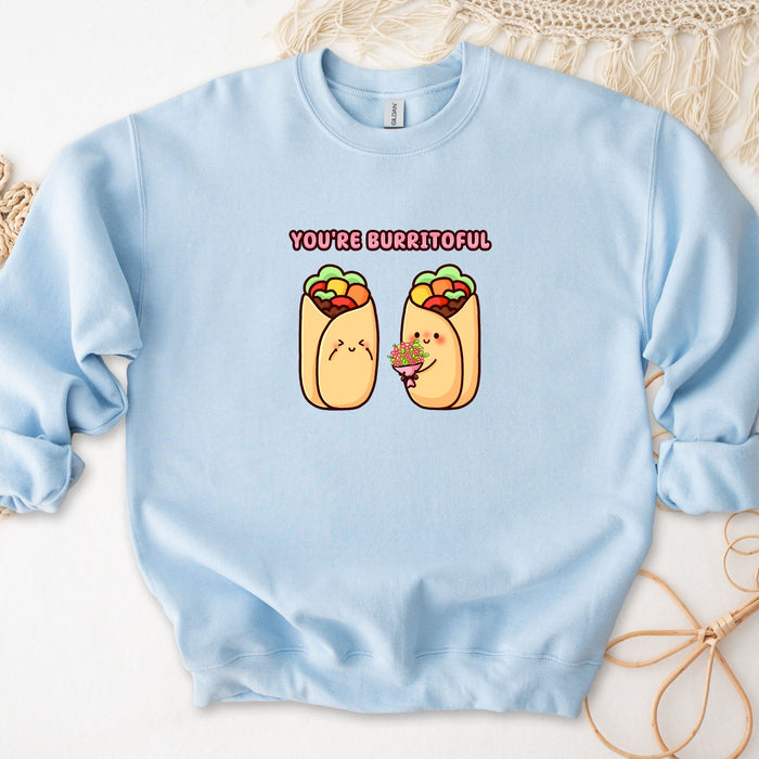 a blue sweatshirt with two burritos on it