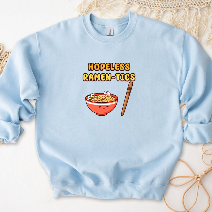 a blue sweatshirt with a bowl of ramen on it