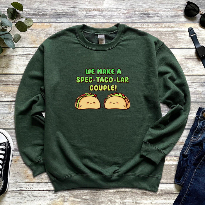 a green sweatshirt that says we make a spec - taco - la couple