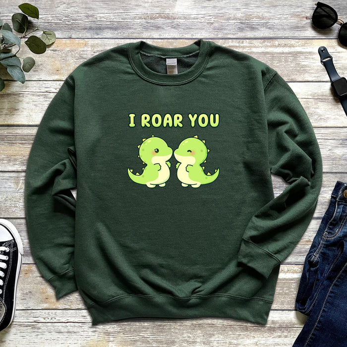 a green sweatshirt that says i roar you