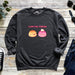 a sweatshirt with two donuts on it and the words i love you, pudding