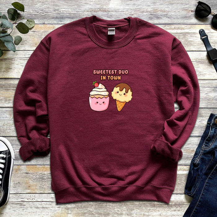 a red sweatshirt with two ice cream cones on it