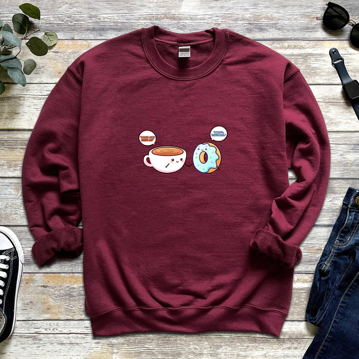 a red sweatshirt with donuts and coffee on it