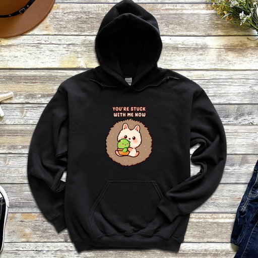 a black hoodie with an image of a hedge holding a green leaf