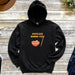 a black hoodie with a bowl of ramen - tics on it