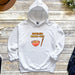 a white hoodie with a picture of a bowl of noodles on it