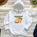 a white hoodie with a pizza slice on it