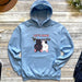 a blue hoodie with a picture of two dogs on it