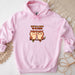 a pink hoodie with two owls on it