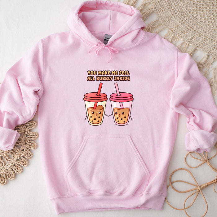 a pink hoodie with two cups of coffee on it