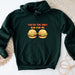 a green sweatshirt with two hamburgers that says you&#39;re the only run for
