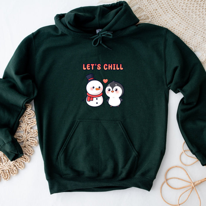 a green hoodie with a picture of a penguin and a snowman on it