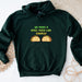 a green hoodie with two tacos on it