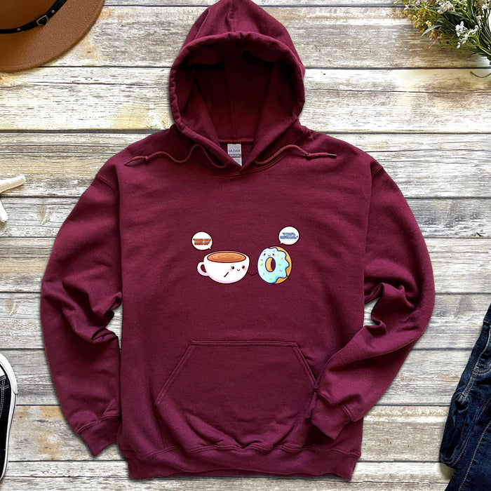 a maroon sweatshirt with coffee and donuts on it