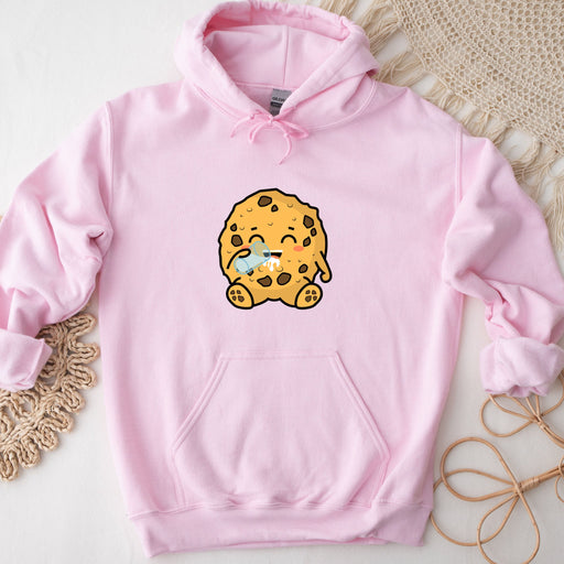 a pink hoodie with a picture of a cookie holding a cup of coffee