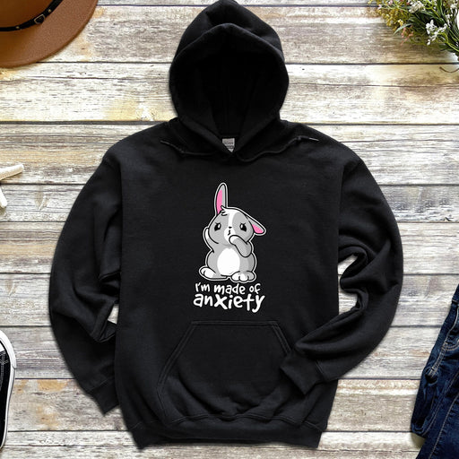 a black hoodie with a cartoon bunny on it