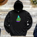 a black hoodie with a green frog wearing a party hat