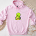 a pink hoodie with a cartoon turtle on it