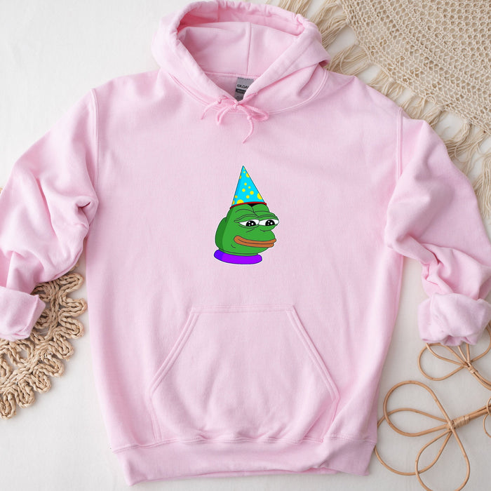 a pink hoodie with a cartoon of a frog wearing a party hat