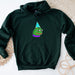 a green hoodie with a frog wearing a party hat