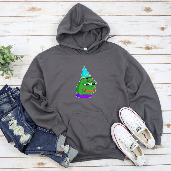 a hoodie with a picture of a frog wearing a party hat