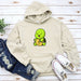 a white hoodie with a cartoon character on it