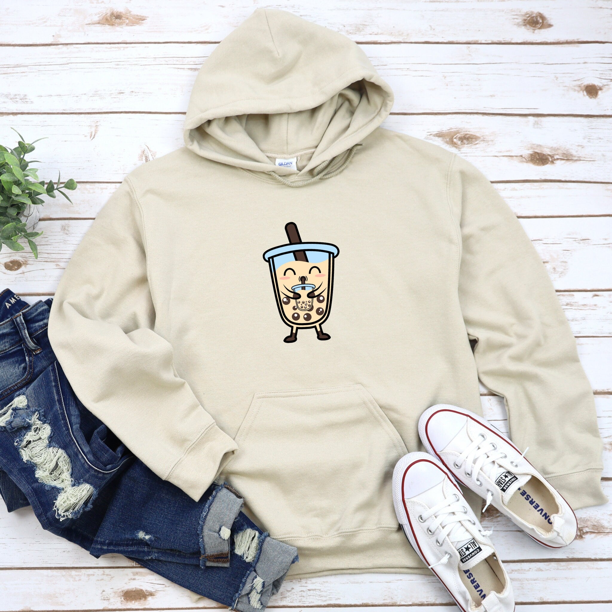 a hoodie with a picture of a drink on it