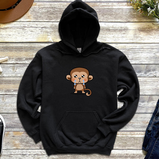 a black hoodie with a cartoon monkey on it