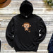 a black hoodie with a cartoon monkey on it