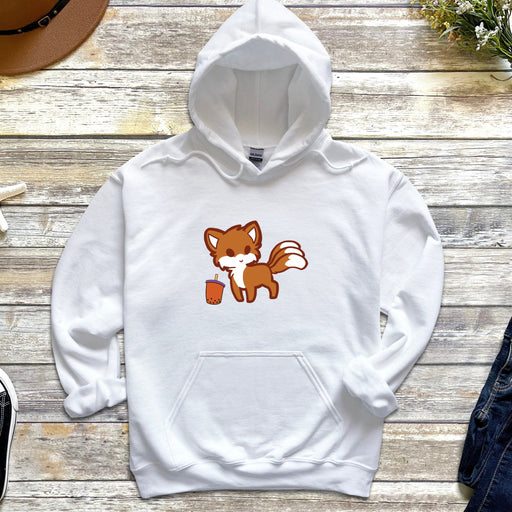 a white hoodie with a cartoon fox on it